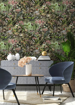 Jungle Life wallpaper by Brand McKenzie in green, jungle animals in dense foliage in a dining room