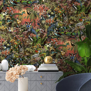 Jungle Life wallpaper by Brand McKenzie in orange, jungle animals in dense foliage behind a dining table