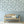 Kelp Forest wallpaper by XV Interiors in grey, kelp and seaweed in a living room