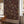 Kelp Forest Wallpaper in Garnet Red wallpaper by XV Interiors in red and green, kelp and seaweed in a styled room setting
