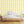 Scallop Lane wallpaper by Liberty James Studio in yellow and cream, scalloped stripes in a kitchen