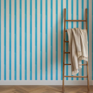 Blue Watercolour Beach Stripe wallpaper by Seed Home Designs in blue and white, watercolour beach stripes in a bathroom