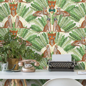 Leopard wallpaper by Brand McKenzie in green and cream, leopards among palm fronds in a home office