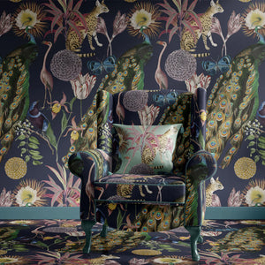 Les Plumes wallpaper by Tatie Lou in navy, exotic birds and blooms in a living room