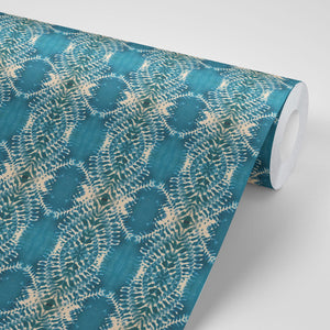Lumiere wallpaper by Tatie Lou in teal, roll showing an Art Deco medallion