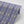 Lumiere wallpaper by Tatie Lou in lilac, partly unrolled roll showing an Art Deco medallion