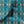 Lumiere velvet by Tatie Lou in teal, draped, showing an Art Deco medallion