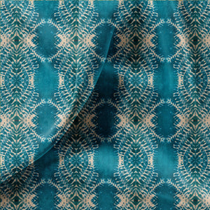 Lumiere velvet by Tatie Lou in teal, draped, showing an Art Deco medallion