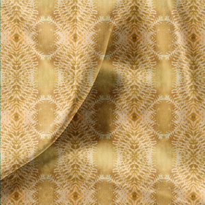 Lumiere velvet by Tatie Lou in yellow, in soft folds showing an Art Deco medallion