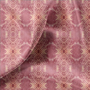 Lumiere velvet by Tatie Lou in pink, draped close-up of an Art Deco medallion