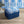 Marco Island Eco velvet by Liberty James Studio in blue, a scrolling damask design covering a footstool