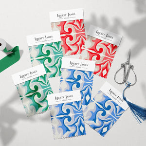 Marco Island Eco velvet by Liberty James Studio in green, sample swatch cards showing a scrolling damask design