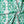 Marco Island Eco velvet by Liberty James Studio in green, draped close-up of a scrolling damask design