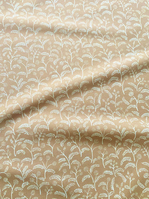 Margaux linen by Claire de Quénetain in beige and pink, draped, showing delicate sprigs