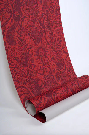 Squirrel and Sunflower wallpaper by St. Jude's in red, sample roll showing squirrels and sunflowers