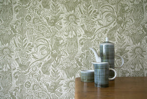 Squirrel and Sunflower wallpaper by St. Jude's in green, squirrels and sunflowers in a kitchen