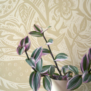 Wren wallpaper by St. Jude's in beige, wrens among leaves above a sideboard