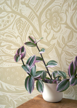 Wren wallpaper by St. Jude's in beige, wrens among leaves above a sideboard