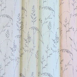 Cornish Meadow linen by Seed Home Designs in grey, draped, showing fine meadow grasses