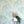 Mermaids wallpaper by Dupenny in pale green, mermaids and waves in an interior setting