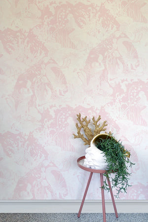 Mermaids wallpaper by Dupenny in pale pink, mermaids and waves in a styled room setting