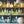 Mixology wallpaper by Brand McKenzie in black, detail of shelves of colourful bottles