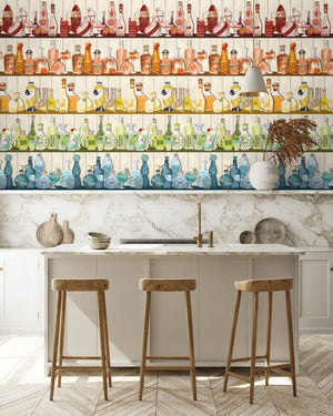 Mixology wallpaper by Brand McKenzie in cream, close view of shelves of colourful bottles