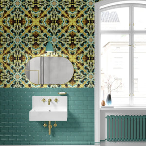 Molten Mosaic wallpaper by Liberty James Studio in yellow, green and blue, a kaleidoscope mosaic in a bathroom