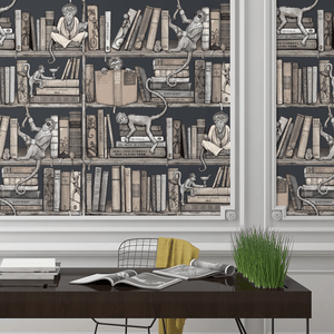 Monkey Library wallpaper by Brand McKenzie in taupe, monkeys in a bookcase in a home office