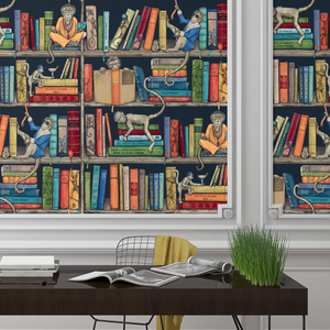 Monkey Library wallpaper by Brand McKenzie in navy, monkeys in a bookcase in a home office