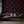 Newtown Creek wallpaper by XV Interiors in brown, drifting feathers in a living room