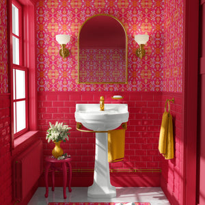Naples wallpaper by Liberty James Studio in pink, an ornate kaleidoscope design in a bathroom