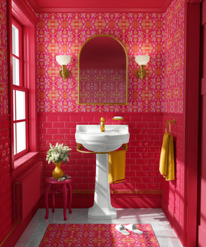 Naples wallpaper by Liberty James Studio in pink, an ornate kaleidoscope design in a bathroom
