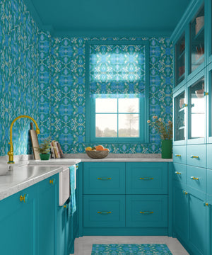 Naples wallpaper by Liberty James Studio in blue, an ornate kaleidoscope design in a bathroom setting