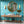 Naples wallpaper by Liberty James Studio in blue, an ornate kaleidoscope design on a bathroom wall