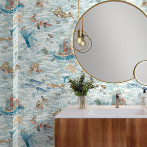 Ocean Waves wallpaper by Brand McKenzie in blue, sea creatures in rolling waves in a bathroom setting
