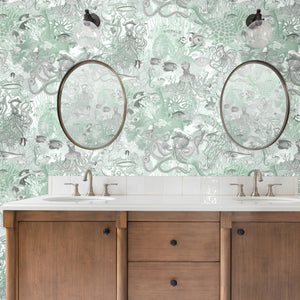 Octopus wallpaper by Brand McKenzie in mint green, octopus and sea life in a bathroom setting