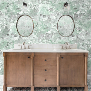 Octopus wallpaper by Brand McKenzie in mint green, octopus and sea life in a bathroom