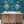 Octopus wallpaper by Brand McKenzie in turquoise, octopus and sea life on a bathroom wall