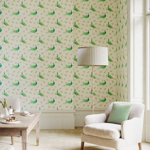 Sustainable Olive and Dot Peacock wallpaper by Seed Home Designs in blue and green in a living room