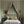 Olive wallpaper by Annika Reed in green, olive branch stripes in a bedroom