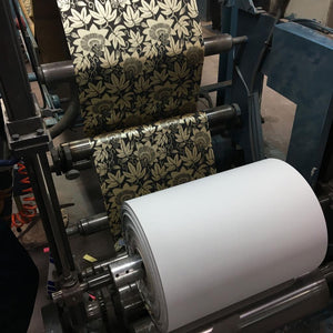 Passion Flower wallpaper by The Monkey Puzzle Tree in gold and black, the artist painting the original artwork