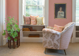 Coromandel Flower linen by Parker and Jules in beige and green, paisley flower sprays in a living room