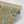 Pachamama wallpaper by Tatie Lou in beige, sample roll showing flying cranes