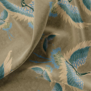 Pachamama velvet by Tatie Lou in beige, draped, showing flying cranes
