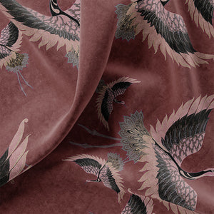 Pachamama velvet by Tatie Lou in burgundy, in soft folds showing flying cranes