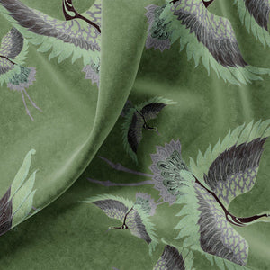 Pachamama velvet by Tatie Lou in olive, draped close-up of flying cranes