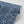 Pachamama wallpaper by Tatie Lou in navy, roll showing flying cranes