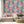 Painting in Colour wallpaper by Brand McKenzie in multicolour, painterly floral clouds in a living room