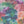 Painting in Colour wallpaper by Brand McKenzie in pink and teal, close-up of painterly floral clouds